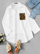 Patched Leopard Pocket Dip Hem Top