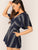 V-neck Slant Pocket Striped Romper