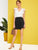 Embroidered Eyelet Ruffle Armhole Low Side Bodysuit