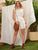 Ruffle Trim Backless Eyelet Embroidered Belted Romper