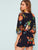 Surplice Neck Belted Floral Print Romper