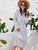 Polka Dot Tie Neck Layered Hem Dress